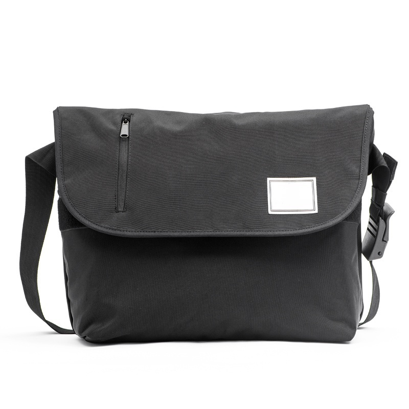 A messenger bag,Messenger bags combine practicality and comfort, meeting everyday needs while enhancing the overall look, making them suitable for various occasions.